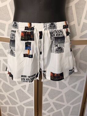 White Graphic Men's Swim Trunks with Black & Orange Accents
